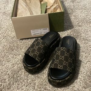 Black denim Gucci platform slides